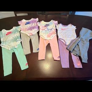 Baby Girl Nike bodysuit and leggings sets (4)